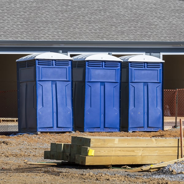 what is the cost difference between standard and deluxe portable toilet rentals in Spruce Head ME